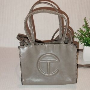 Telfar Mini Shopping Bag. Gray in color.